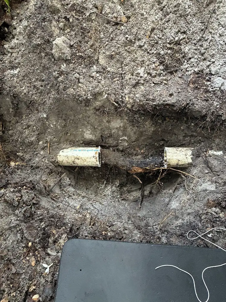 Broken PVC sewer line section found during a camera-located sewer diagnosis in Belleair, Florida