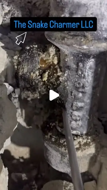 Snake Charmer LLC reel thumbnail — cast iron sewer stack opened from the wall and cleared with a hydrojet